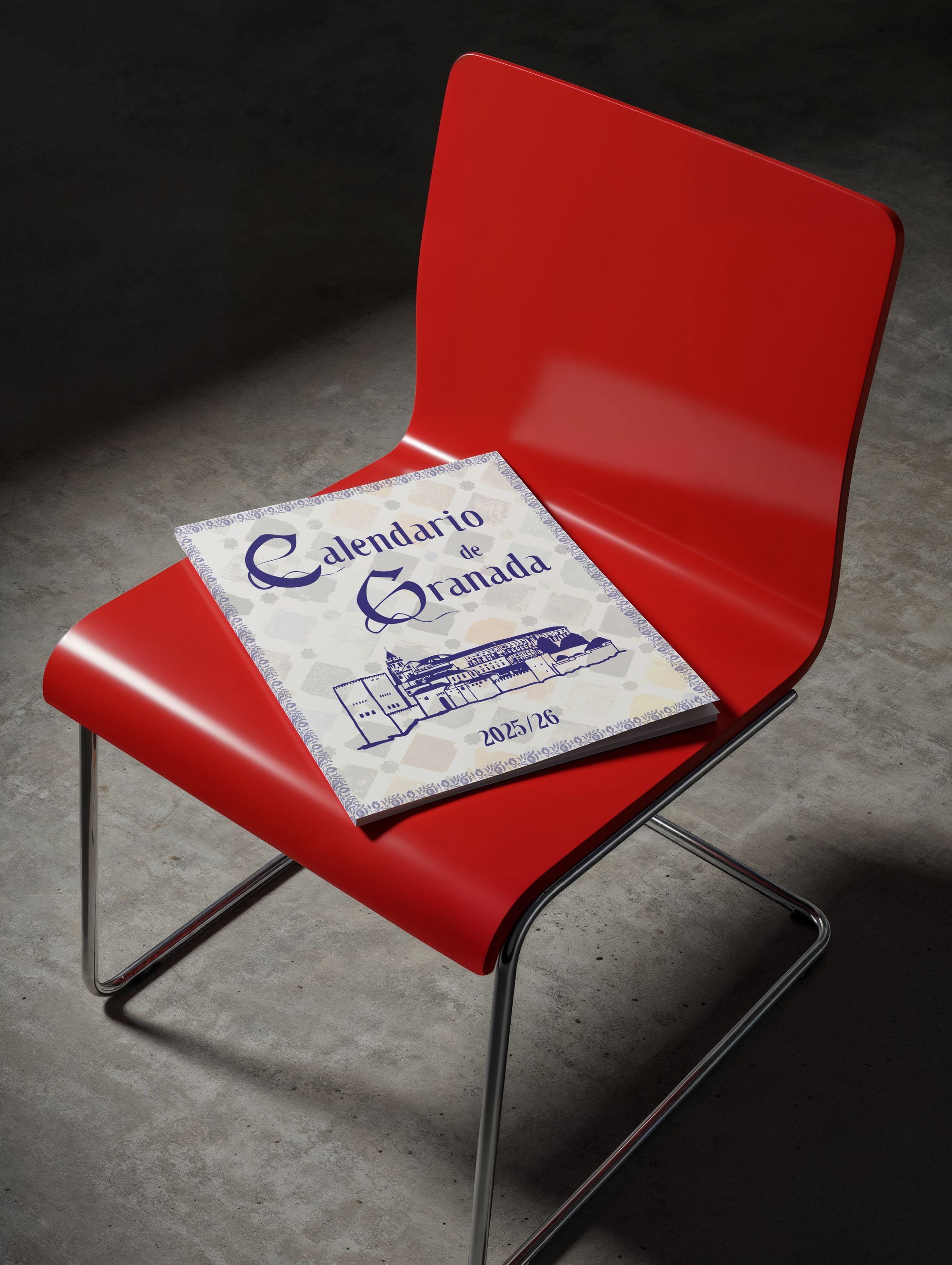 A printed calendar set in the typeface, resting on a red chair in a dark room.